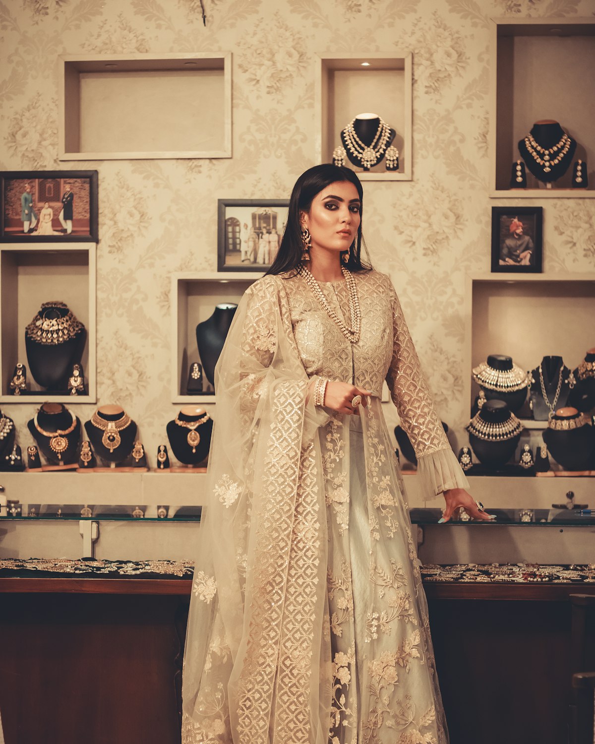 Woman in a beige embroidered suit set