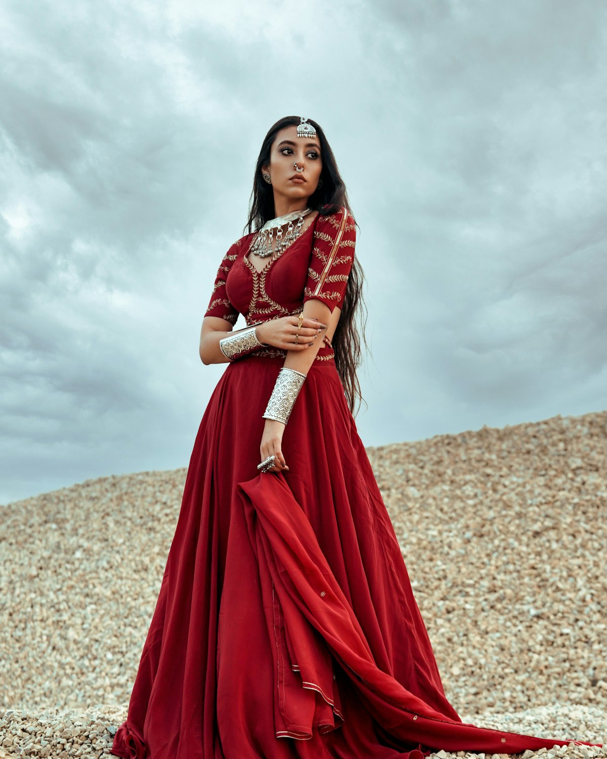 Woman in a flowing red festive gown